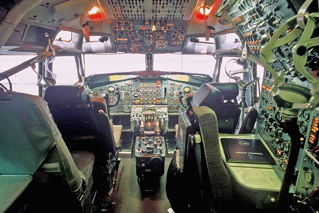 Classic Boeing 707 analog cockpit with Captain, First Officer and Flight Engineer stations.
